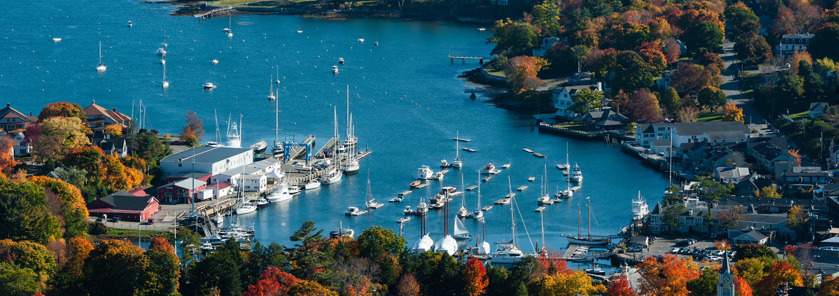 Aerial view of Camden, Maine harbor in fall